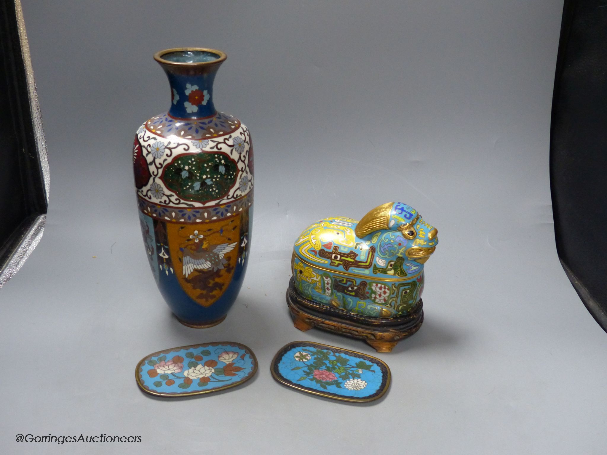 A Japanese cloisonne enamel vase, two similar dishes and a 20th century Chinese cloisonne enamel mythical beast box & cover